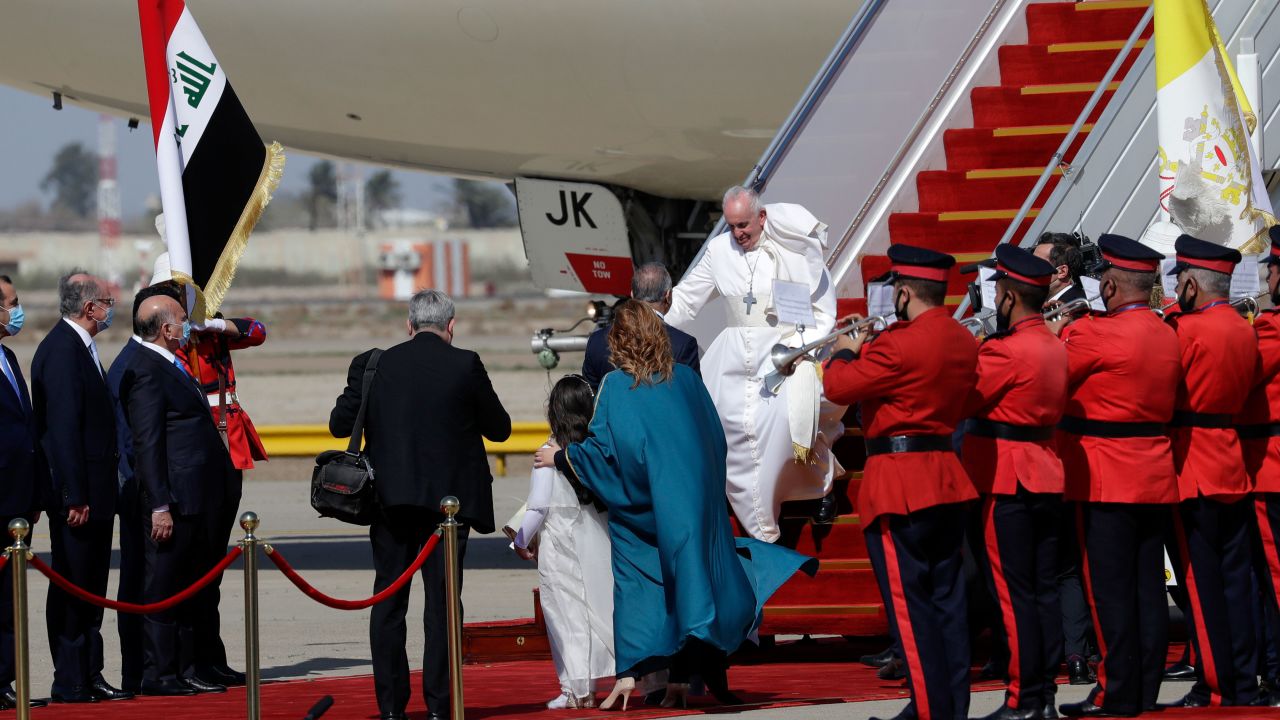 Pope Francis arrives at Baghdad's international airport, Iraq, Friday, March 5, 2021. 