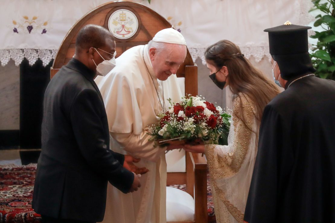 Pope Francis is welcomed upon his arrival at the Sayidat al-Nejat (Our Lady of Salvation) Cathedra.