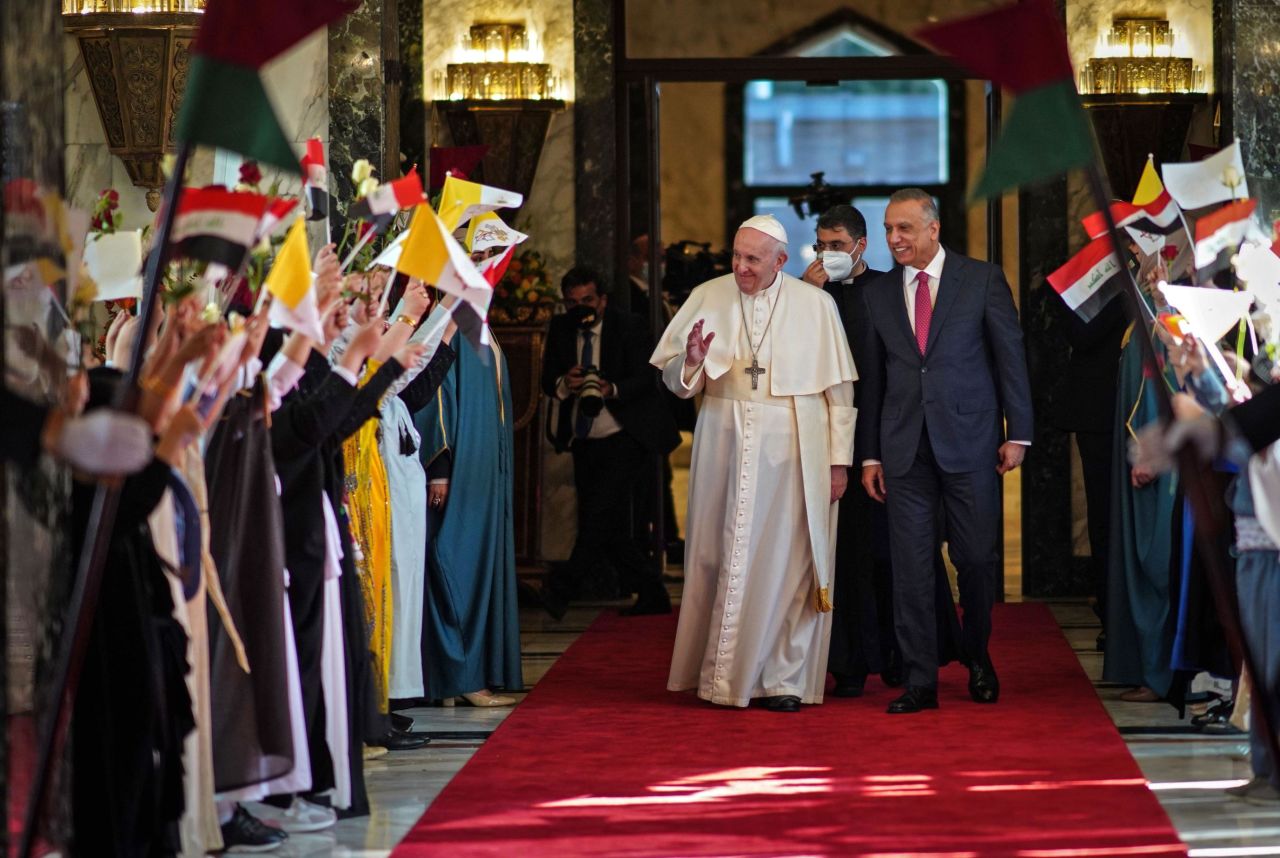 The Pope is welcomed at Baghdad International Airport by Iraqi Prime Minister Mustafa al-Kadhimi on Friday.