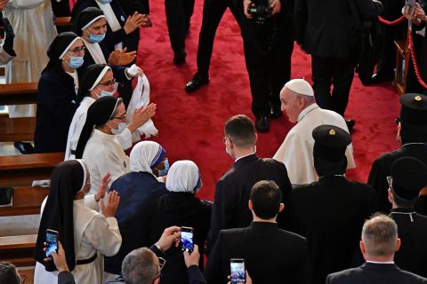 Nuns welcome Pope Francis at Our Lady of Salvation.