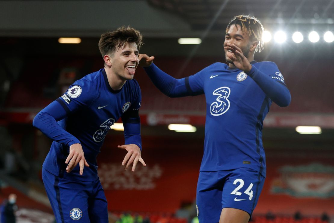 Mason Mount (left) celebrates scoring for Chelsea against Liverpool.