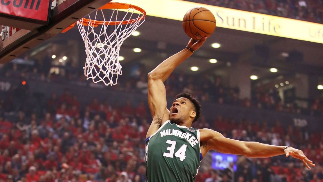 Antetokounmpo dunks the ball during the first half against the Toronto Raptors. 
