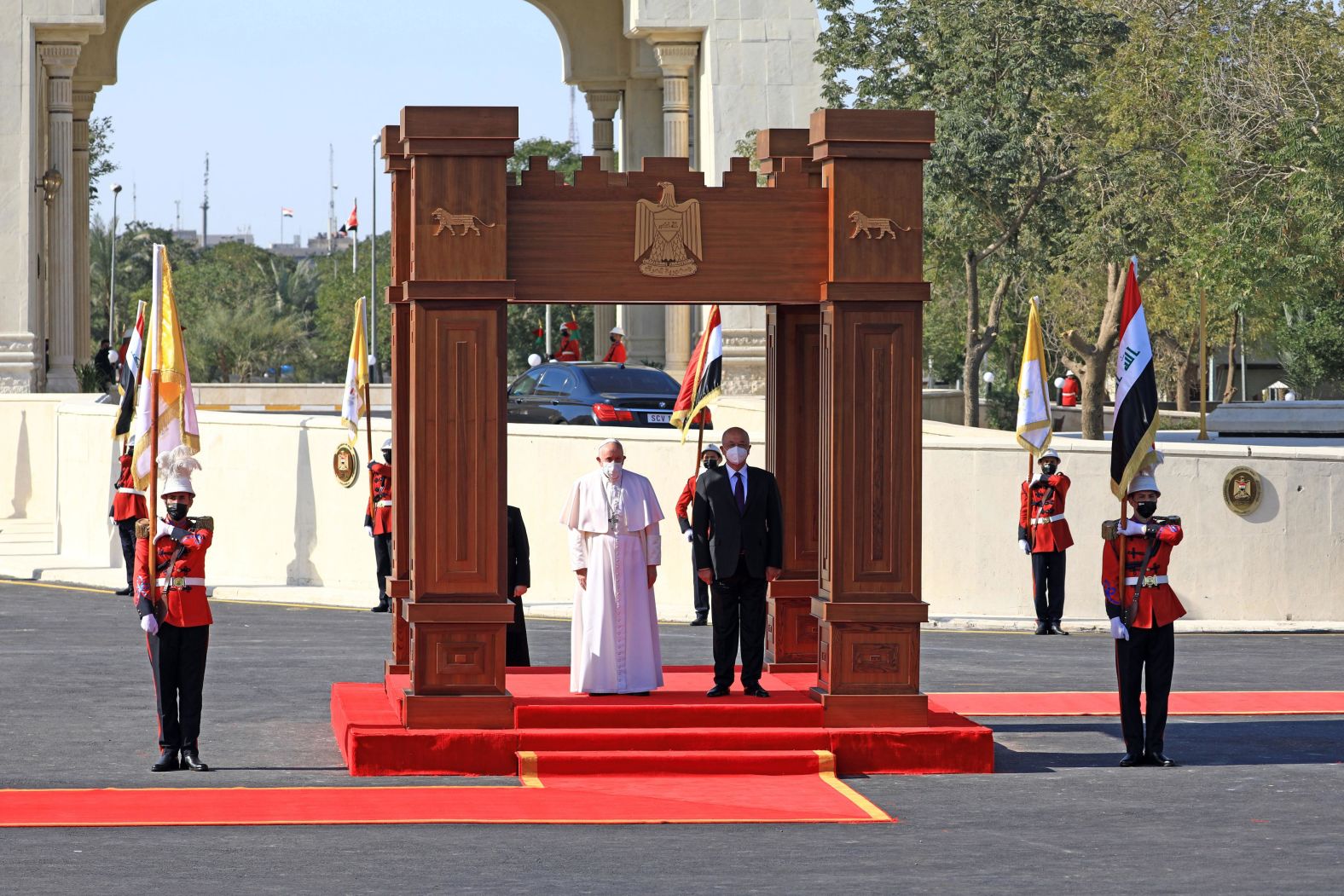 Iraqi President Barham Salih welcomes the Pope to the Presidential Palace.