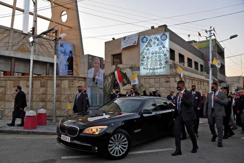 The Pope leaves a Baghdad church, Our Lady of Salvation, on Friday. The church was the site of <a href="http://cnn.com/2021/03/04/middleeast/iraq-pope-christians-intl/index.html" target="_blank">a massacre in 2010.</a>