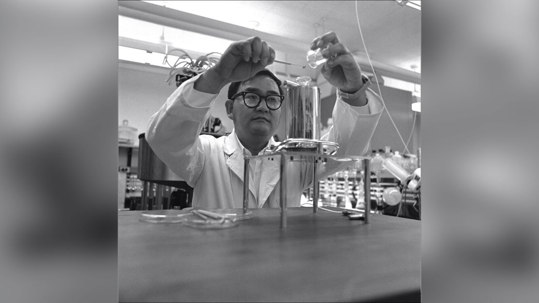 Life Detection Systems branch chief Vance Oyama dispersed lunar soil in equal amounts to thousands of petri dishes for multiple experiments and studies.