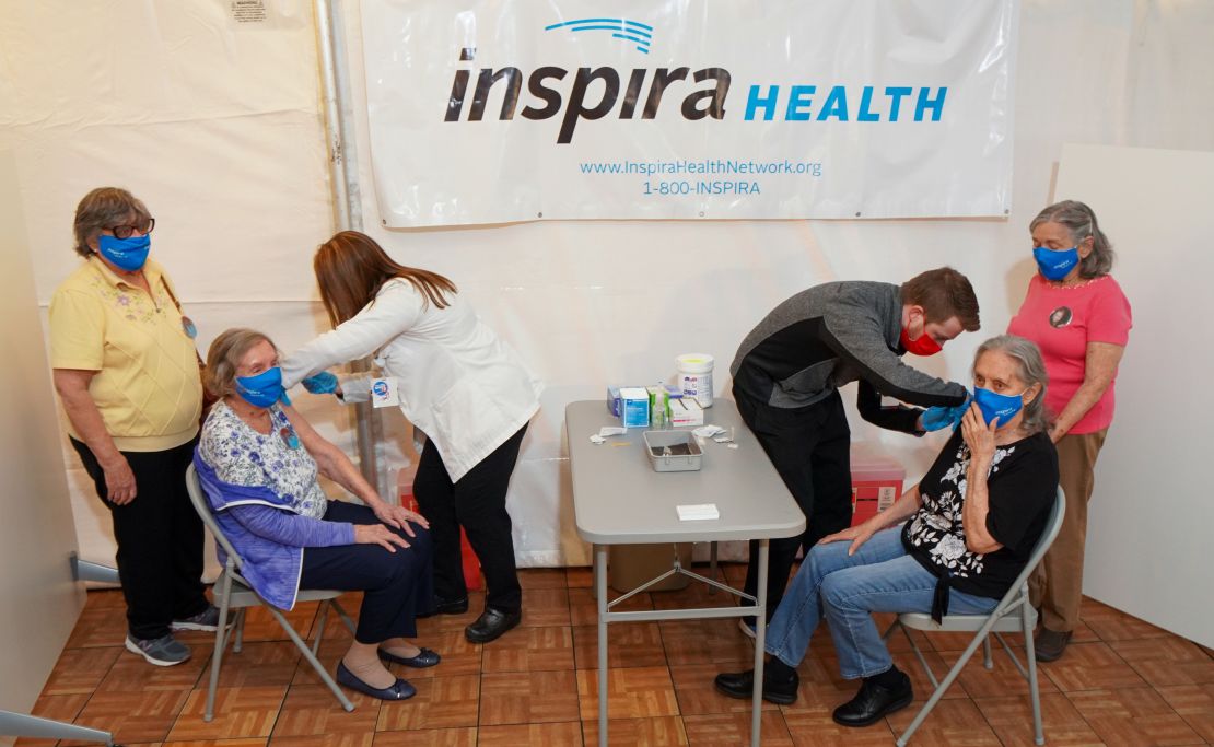 From left, Rose Ramsey, Edith Camp, Nora McDonald, and Bernice Cecil receive the second dose of the Pfizer/BioNTech Covid-19 vaccine at Inspira Medical Center Mullica Hill.