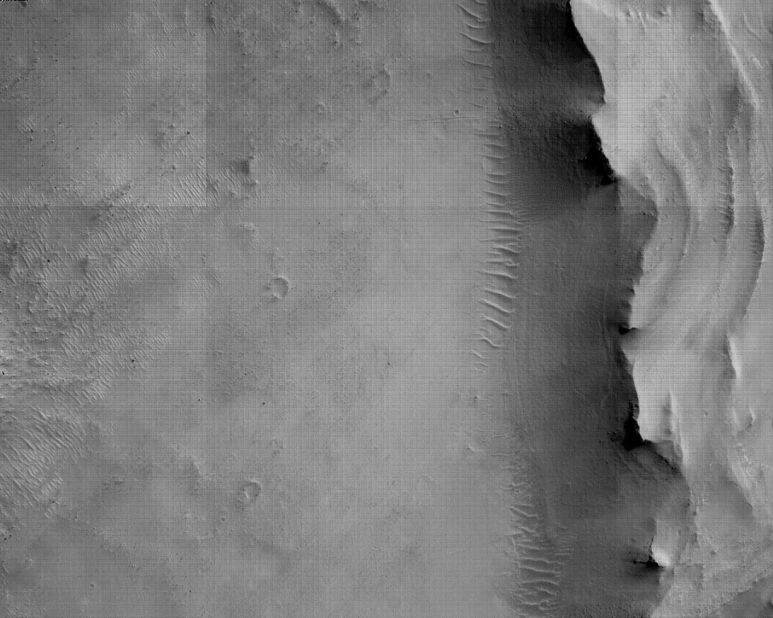 This image of Mars' surface was taken using a camera mounted to the bottom of the rover.