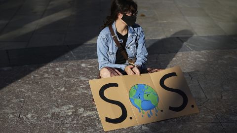 A girl with a sign in Plaza del Carmen Square on September 25, 2020 in Granada, Spain. Following the call of Greta Thunberg for a World School Strike and 'Fridays for future', students took to the streets to denounce government inaction towards the climate crisis. 