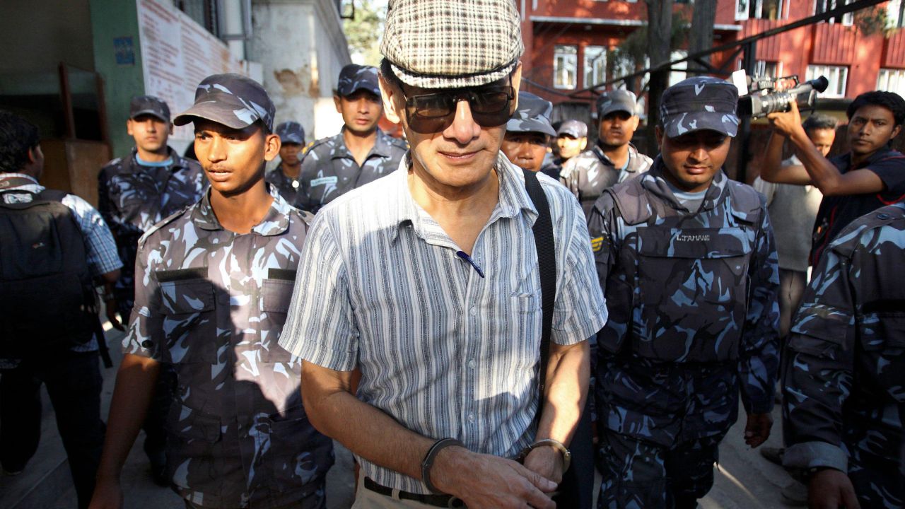 Sobhraj leaves Kathmandu district court after a hearing on May 31, 2011.