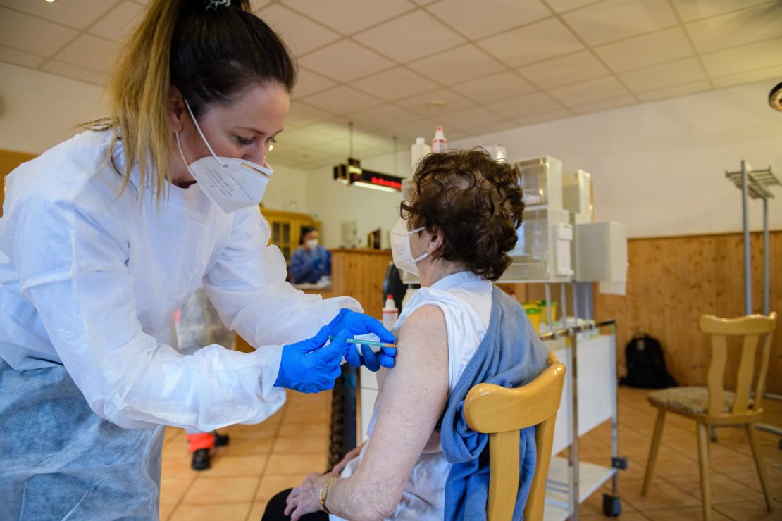 An elderly local resident is inoculated with the Pfizer-BioNTech vaccine in Seidewitz on March 1, 2021 near Naumburg, Germany.