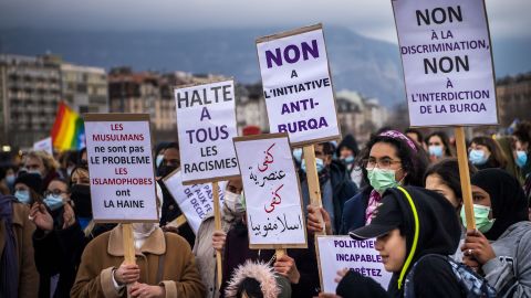 Activists demonstrate against the "anti-burqa" initiative in Geneva on March 5, 2021.