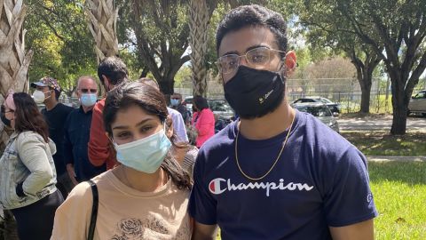 Saima Haque, left, and her brother Miraj traveled from Boynton Beach to Florida City in order to get a vaccine Sunday, but they were turned away.