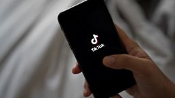 Signage for ByteDance Ltd.'s TikTok app is displayed on a smartphone in an arranged photograph taken in Arlington, Virginia, U.S., on Monday, Aug. 3, 2020. 