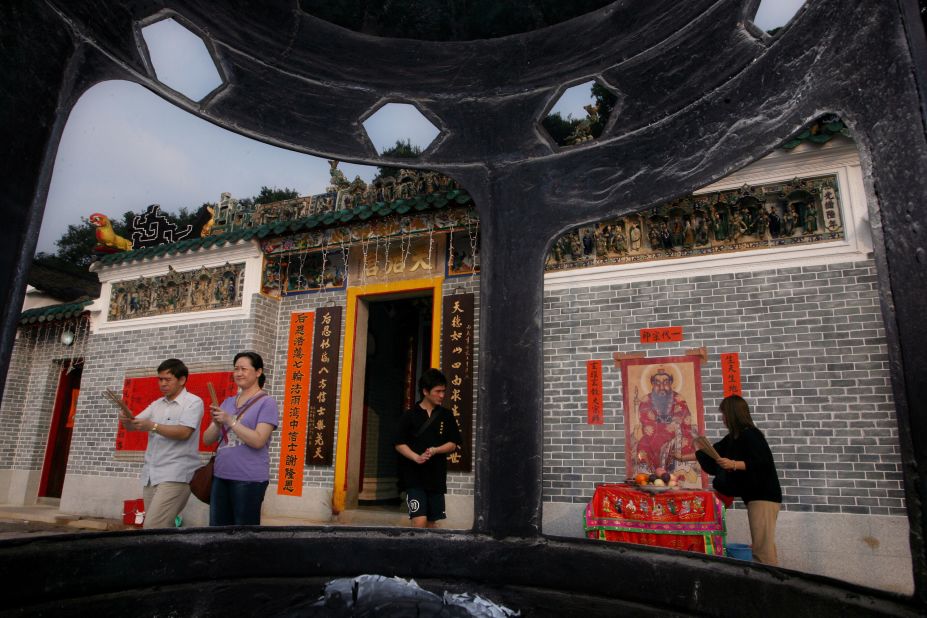 <strong>Blessed visit:</strong> Visitors mark the annual Tai Ping Ching Chiu Festival at a temple on Kat O.