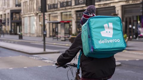 A Deliveroo rider delivering takeaway food  in central London.