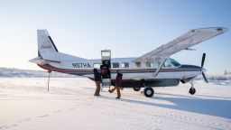 A charter plane in Birch Creek, Alaska, prepares to transport residents to receive the COVID-19 vaccine, Feb. 4, 2021. The coronavirus has spread into the most remote Alaskan villages, a reminder of earlier pandemics that ravaged the state. Now there is a rush to deliver vaccines in time. (Ash Adams/The New York Times)