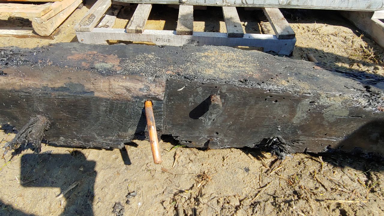 This recovered timber included spikes, possibly made from copper.