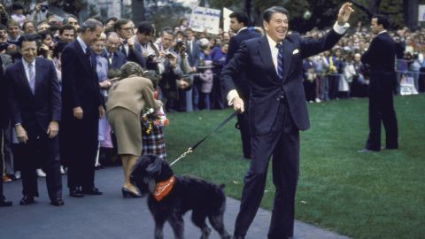 President Ronald Reagan with his dog Lucky as he and first lady Nancy Reagan prepared for a trip to Geneva on November 1, 1985.