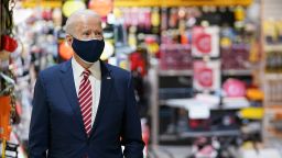 US President Joe Biden visits W.S. Jenks & Son, a hardware store that has benefited from a Paycheck Protection Program (PPP) loan, in Washington, DC, on March 9, 2021. (Photo by Mandel Ngan/AFP/Getty Images)