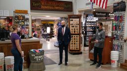 US President Joe Biden (C) visits W.S. Jenks & Son, a hardware store that has benefited from a Paycheck Protection Program (PPP) loan, in Washington, DC, on March 9, 2021. - Biden met with Michael Siegel (R), co-owner of W.S. Jenks & Son, and Mary Anna Ackley (L), owner of Little Wild Things Farm, a business next door to Jenks & Son which also benefited from the PPP. (Photo by Mandel Ngan/AFP/Getty Images)
