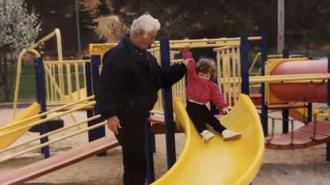 Julie at the park as a young child with her grandfather Donald Gallagher in Sayreville, New Jersey.