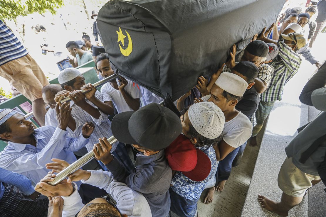People carry the coffin of National League for Democracy member Khin Maung Latt during his funeral in Muslim tradition in Yangon, Myanmar on March 7.