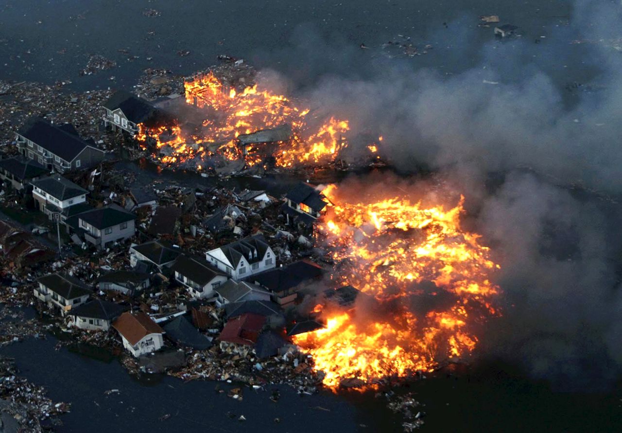 The 2011 tsunami also sparked fires that consumed some houses in Natori city in Miyagi prefecture.