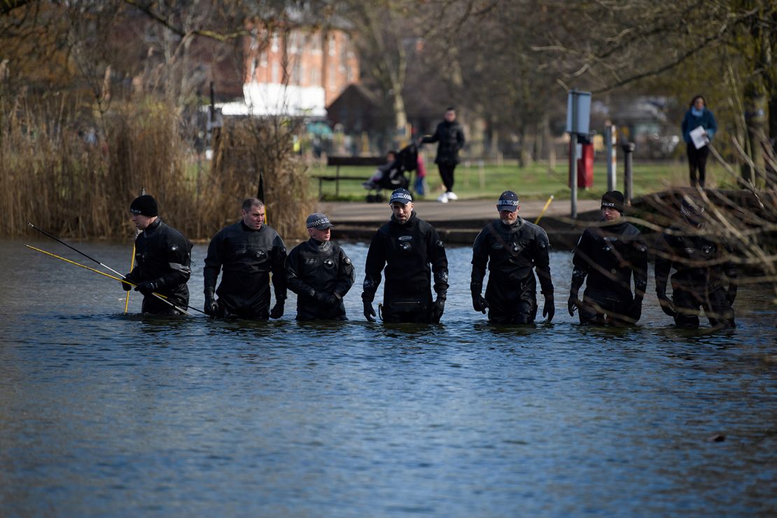 Police search a pond in the hunt for Sarah Everard on March 9.