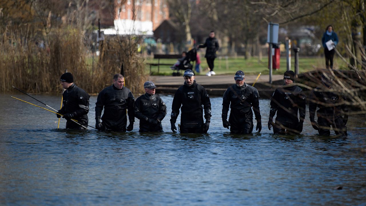 Police search a pond in the hunt for Sarah Everard on March 9.