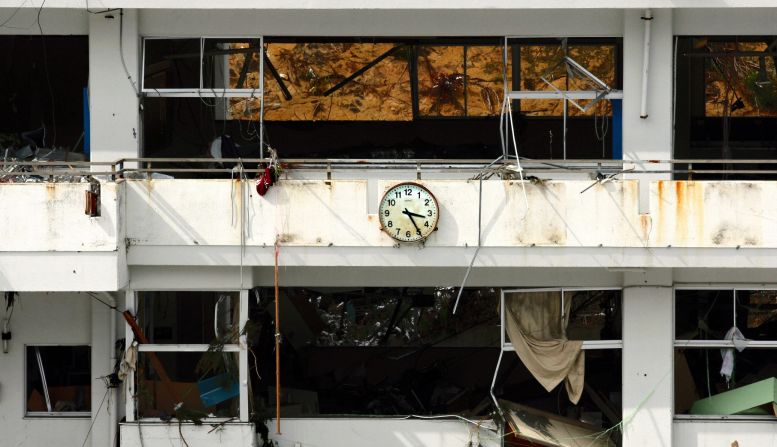 A clock hit by the tsunami remains frozen at 15:25 pm, at Yagawa Elementary School in Ishinomaki. Waves covered almost 5 square kilometers (500 hectares) of the city, <a href="index.php?page=&url=http%3A%2F%2Fitic.ioc-unesco.org%2Findex.php%3Foption%3Dcom_content%26view%3Darticle%26id%3D1949%3A2011-japan-tsunami-before-after-photos%26catid%3D2044%26Itemid%3D2365" target="_blank" target="_blank">according</a> to the International Tsunami Information Center. 