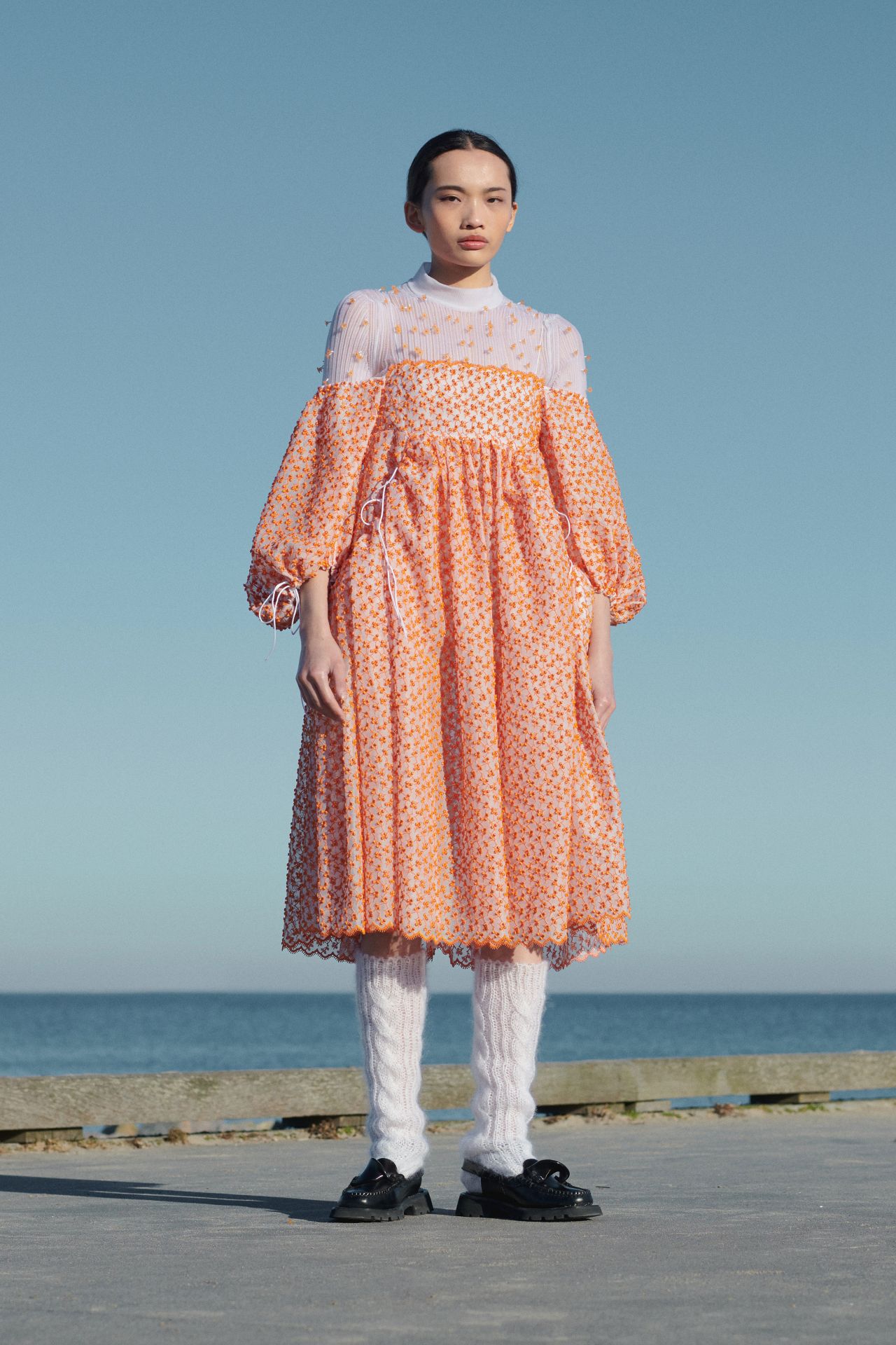 The city was a source of inspiration for Cecilie Bahnsen's Fall-Winter 2021/22 show. The colors in the collection were made to mimic the soft morning light that floods an empty metropolis.