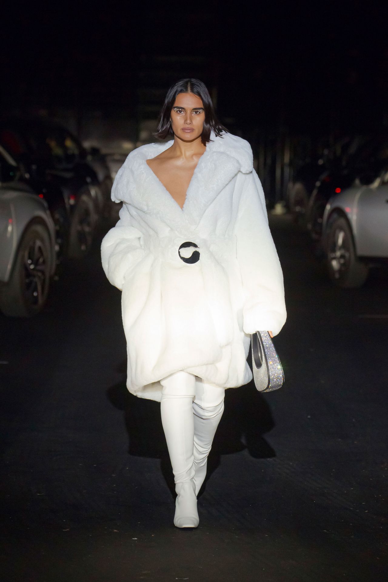 The drive-in fashion show format by Coperni meant models were lit by the headlights of a crowd of electric cars.<br />