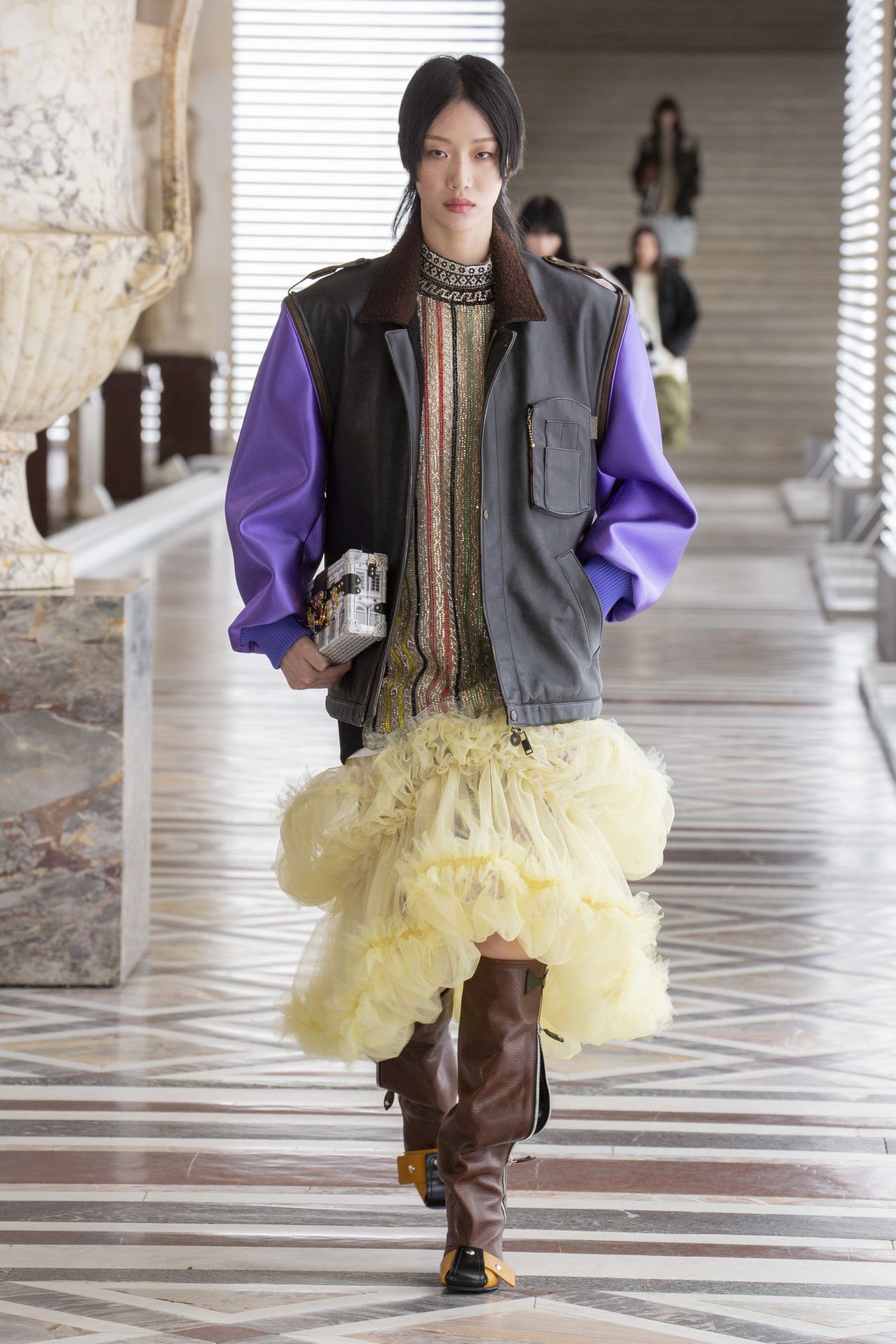 Louis Vuitton Fall-Winter 2021/22 held it's show inside the Louvre.