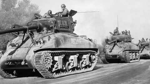 French tanks patrol a North African road near Blida, Algeria, on November 4, 1954.