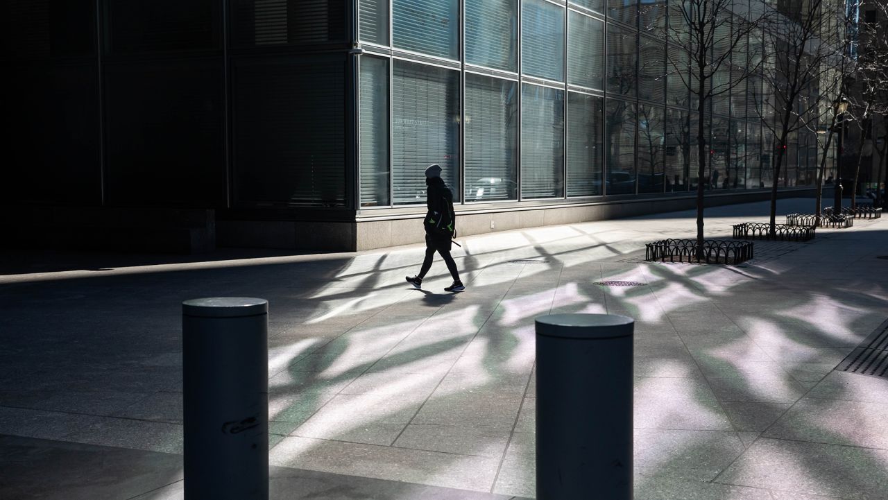 A pedestrian passes in front of Goldman Sachs Group Inc. headquarters in New York, U.S., on Friday, March 5, 2021. Three days after new Citigroup Inc. Chief Executive Officer Jane Fraser?outlined?a net-zero greenhouse-gas emissions target,?Goldman Sachs Group Inc.?CEO?David Solomon?is following suit. Photographer: Michael Nagle/Bloomberg via Getty Images