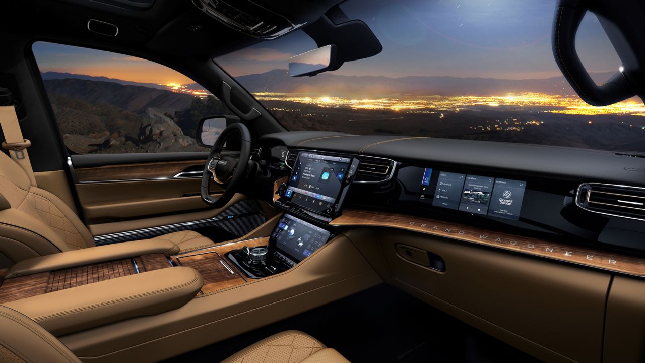 Grand Wagoneer interiors will include lots of wood and leather. Plus an available touchscreen for the front passenger.