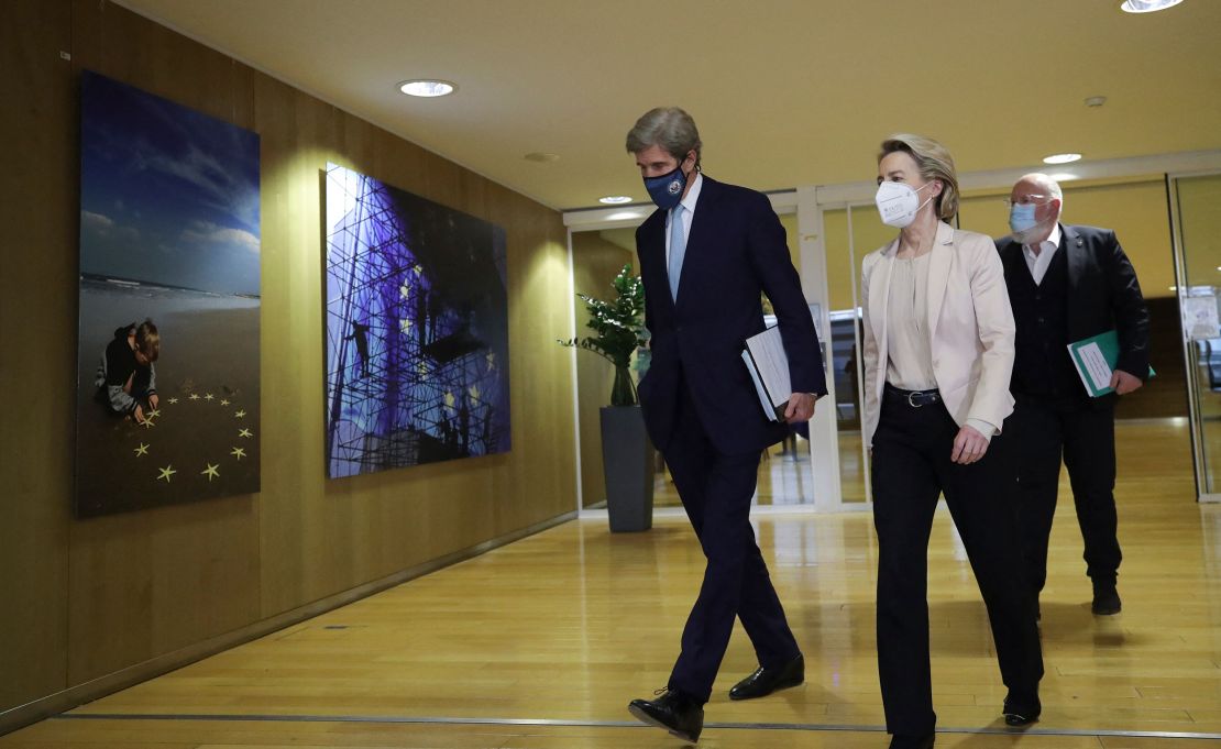 US Special Presidential Envoy for Climate John Kerry, European Commission President Ursula von der Leyen and European Commission vice-president in charge for European green deal Frans Timmermans leave a meeting in Brussels, on March 9, 2021.