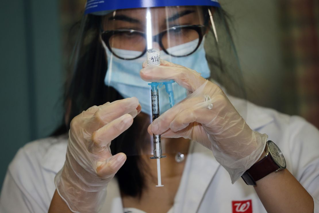 Walgreens pharmacist Jessica Sahni administers the Pfizer-BioNTech COVID-19 vaccine at the New Jewish Home in Manhattan on December 21, 2020 in New York City.