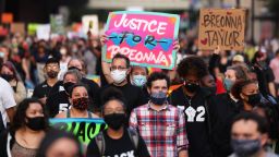 People march in Louisville, Kentucky, last year.