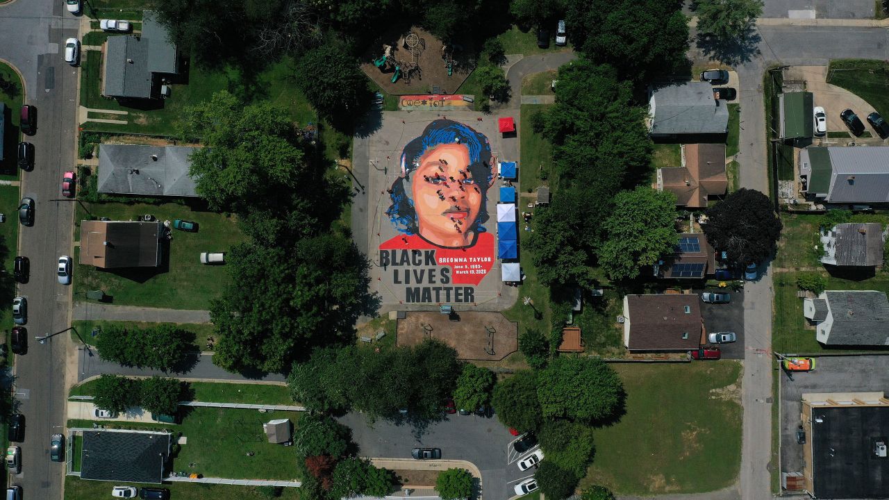 In an aerial view from a drone, a large-scale ground mural depicting Breonna Taylor with the text "Black Lives Matter" is seen being painted at Chambers Park on July 5, 2020 in Annapolis, Maryland.