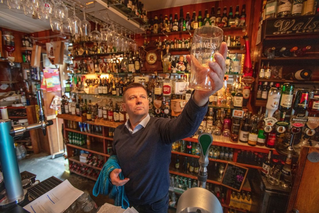 Publican Joe Sheridan poses for a photograph in his closed pub, Walsh's bar, in the Irish village of Dunmore in September 2020. 