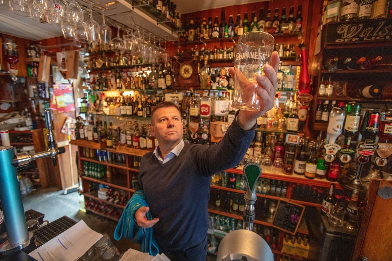Publican Joe Sheridan poses for a photograph in his closed pub, Walsh's bar, in the rural village of Dunmore in the west of Ireland, on September 3, 2020.