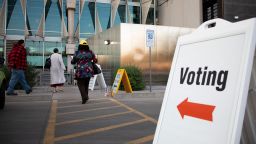 PHOENIX, AZ - NOVEMBER 03: Voters enter Burton Barr Central Library to cast their ballots on November 3, 2020 in Phoenix, Arizona. 