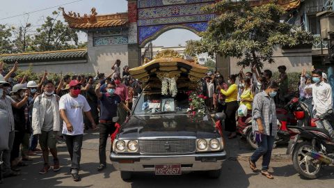 Angel's body is transported from the Yunnan Chinese temple in Mandalay, during her funeral on March 4.