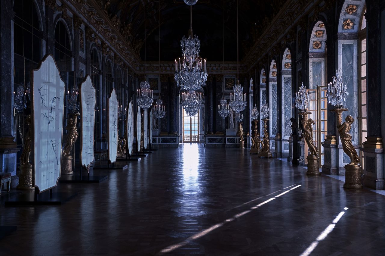 The fashion film presented by Dior, titled "Disturbing Beauty," was shot inside the Hall of Mirrors at Versailles.
