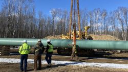 A section of pipe is lifted as Enbridge replaces its Line 3 in Minnesota.