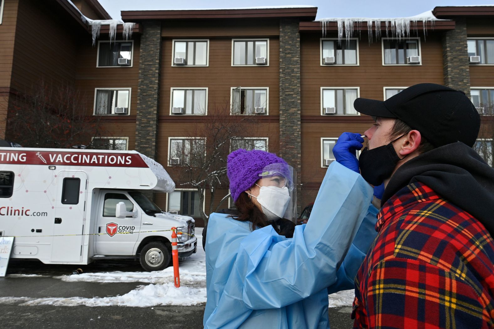 Dr. Jodie Guest tests Failor for Covid-19 at a mobile clinic in Anchorage, Alaska, on March 3. Testing is required for Iditarod mushers before and during the race.