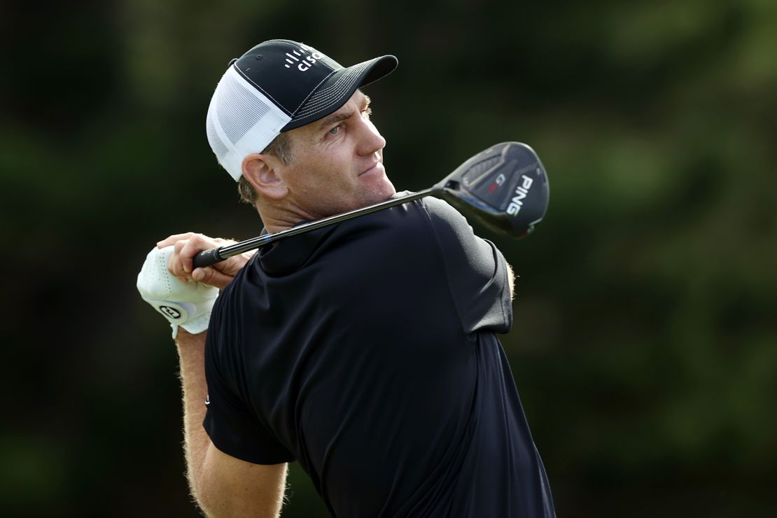 Todd plays his shot from the 18th tee.