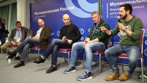 Russian opposition activists (from right) Ilya Yashin, Yevgeny Roisman, Andrei Pivovarov and Vladimir Kara-Mursa speak during a forum hosted by the United Democrats in Moscow before it was broken up by police on Saturday, March 13. 