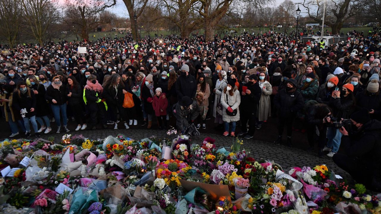 Mourners laid flowers and put down candles at the memorial in Clapham.